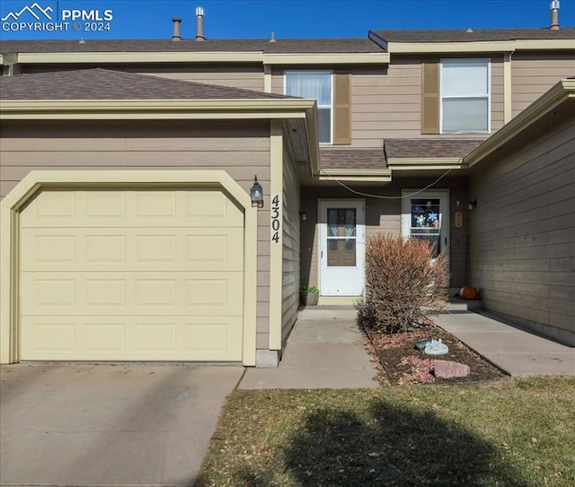 entrance to property with a garage