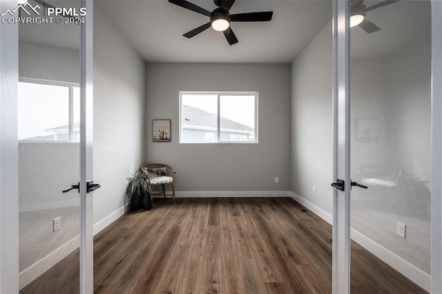 interior space featuring dark hardwood / wood-style floors, ceiling fan, and french doors