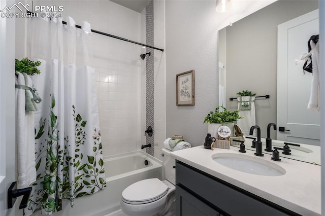 full bathroom featuring shower / bath combination with curtain, toilet, and vanity