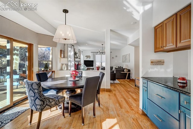 dining space featuring light hardwood / wood-style flooring