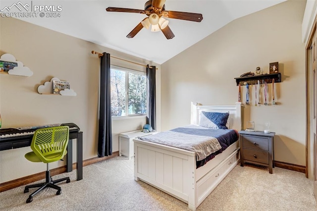 carpeted bedroom featuring ceiling fan and lofted ceiling