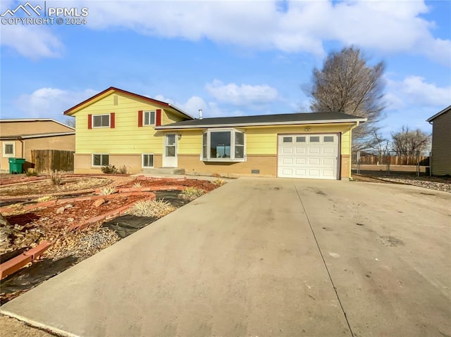 tri-level home featuring a garage