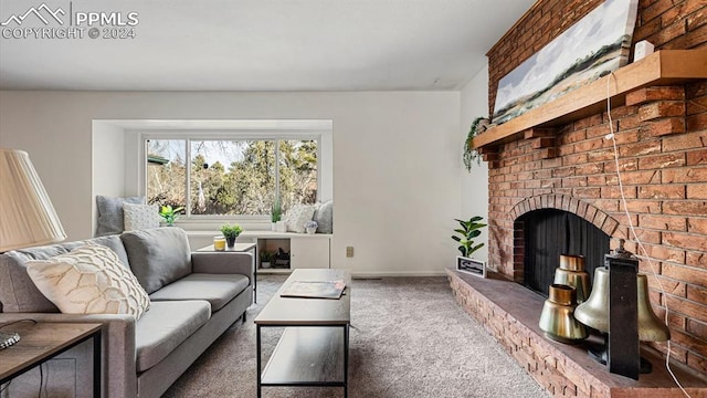 living room featuring dark carpet and a fireplace