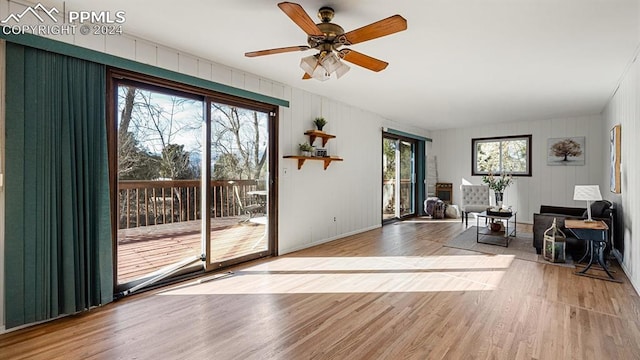 entryway featuring hardwood / wood-style flooring, plenty of natural light, and ceiling fan