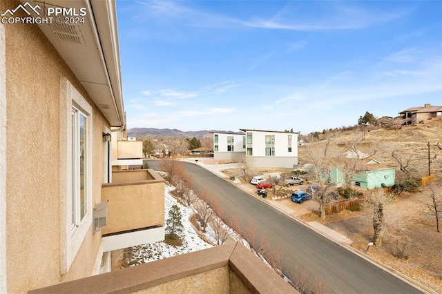 balcony featuring a mountain view