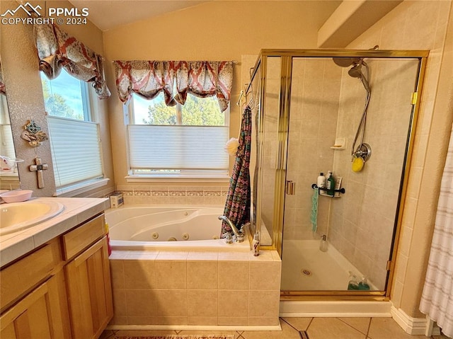 bathroom featuring separate shower and tub, tile patterned flooring, vanity, and a healthy amount of sunlight