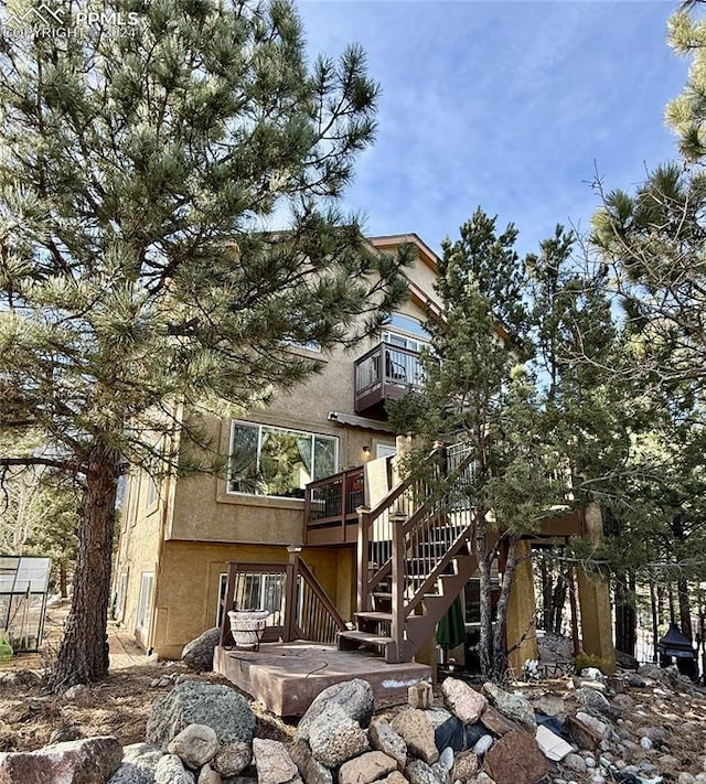 exterior space featuring a balcony