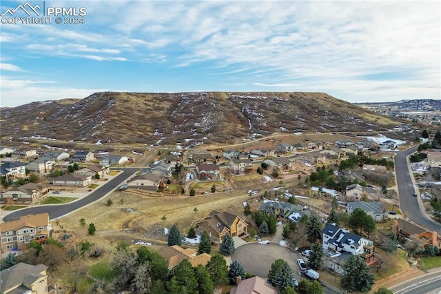 drone / aerial view featuring a mountain view