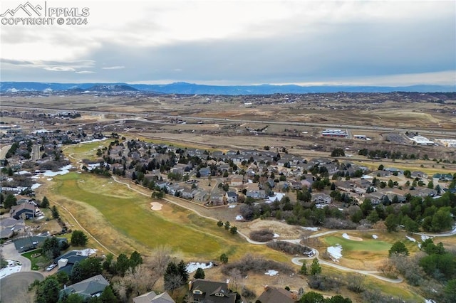 drone / aerial view featuring a mountain view