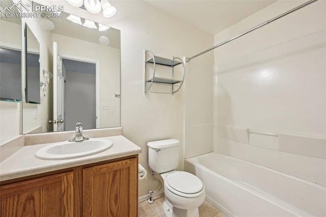 full bathroom with tile patterned floors, vanity, bathtub / shower combination, and toilet