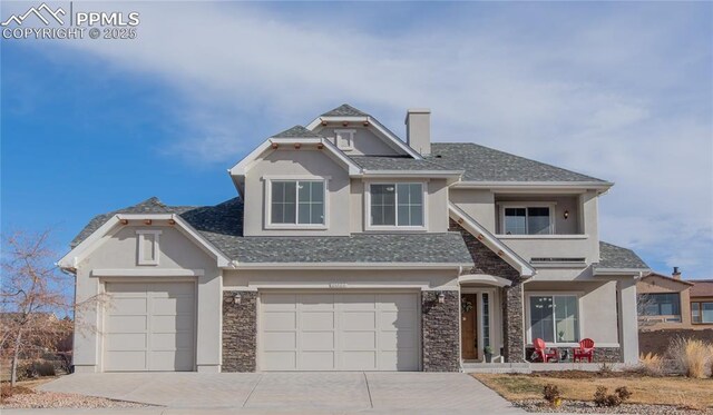 craftsman house with a garage