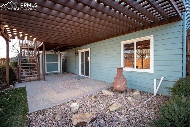 view of patio / terrace featuring a pergola