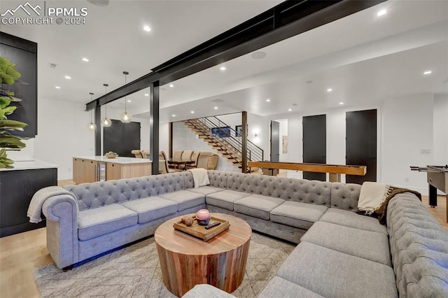 living room with light hardwood / wood-style flooring