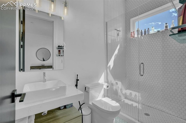 bathroom with walk in shower and toilet