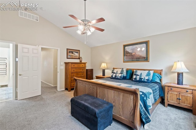 bedroom with ceiling fan, high vaulted ceiling, and light colored carpet