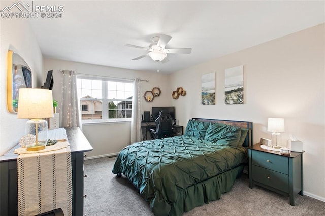 carpeted bedroom featuring ceiling fan