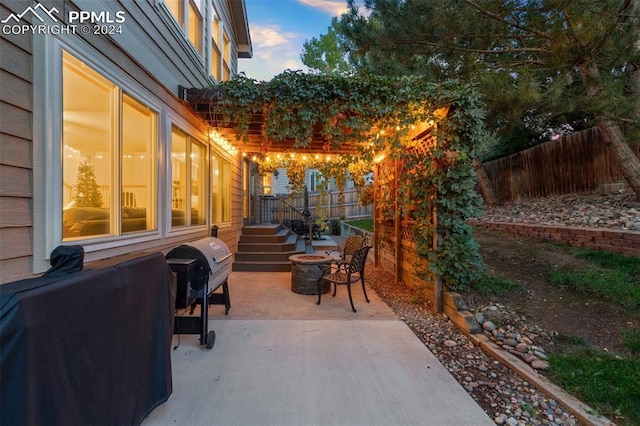 view of patio terrace at dusk