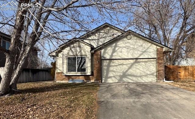 view of front of property featuring a garage