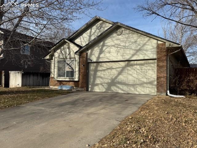 view of property exterior with a garage