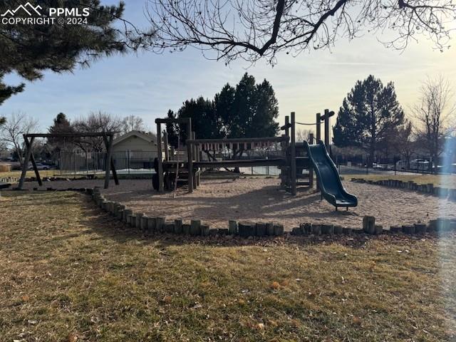 view of jungle gym featuring a yard