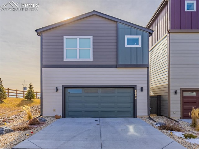 view of front of property featuring a garage