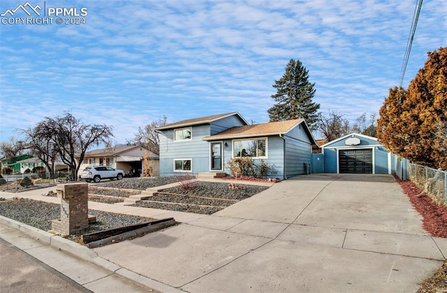 view of front of home with an outbuilding and a garage