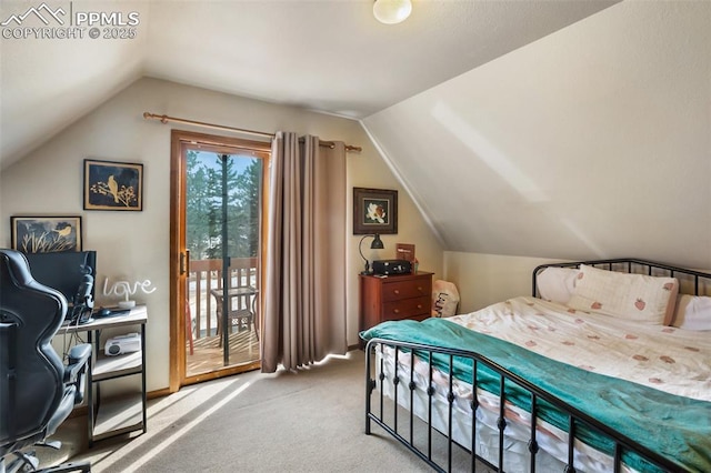 carpeted bedroom featuring lofted ceiling and access to exterior