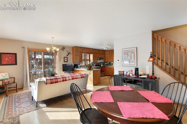 dining space with a chandelier