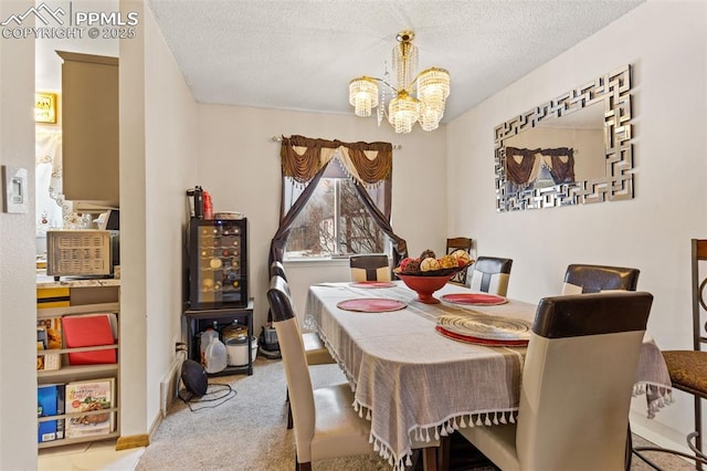 carpeted dining room with a textured ceiling and a notable chandelier