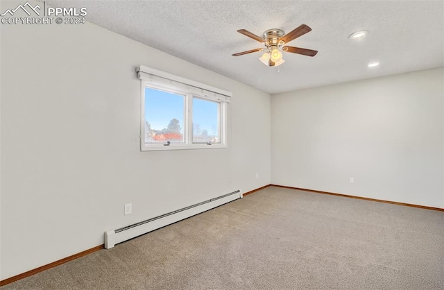 unfurnished room featuring carpet flooring, a textured ceiling, ceiling fan, and a baseboard heating unit