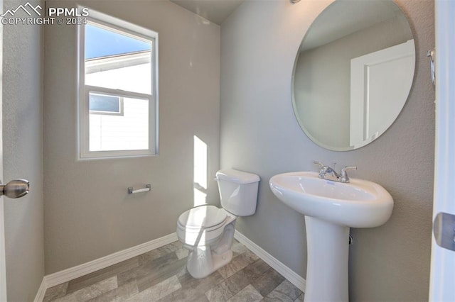 bathroom with toilet and sink