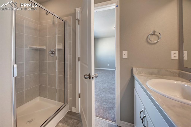 bathroom featuring vanity and walk in shower