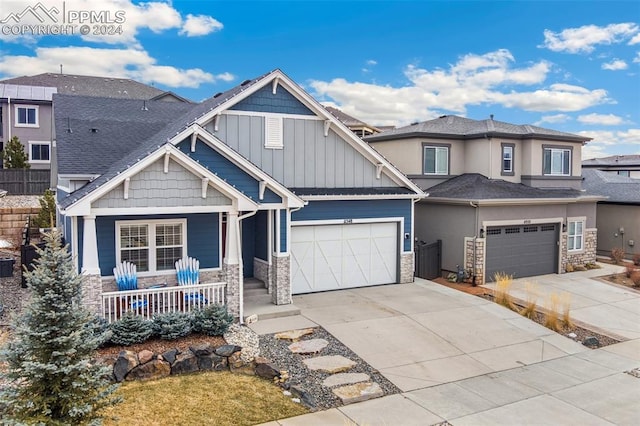 craftsman inspired home featuring a porch and a garage