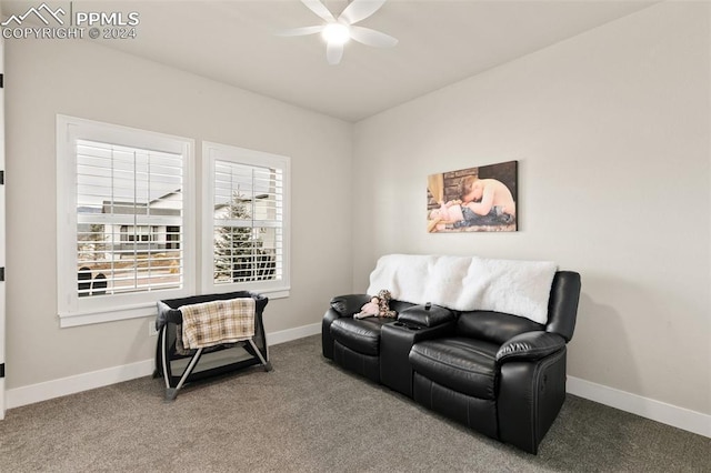 sitting room featuring carpet flooring and ceiling fan