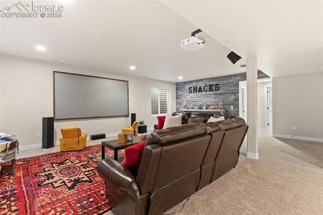 home theater room featuring light colored carpet