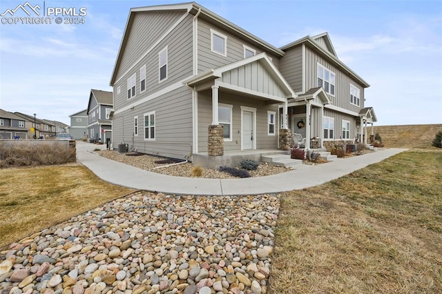 view of side of property with a yard