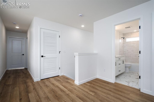 hall featuring light hardwood / wood-style flooring