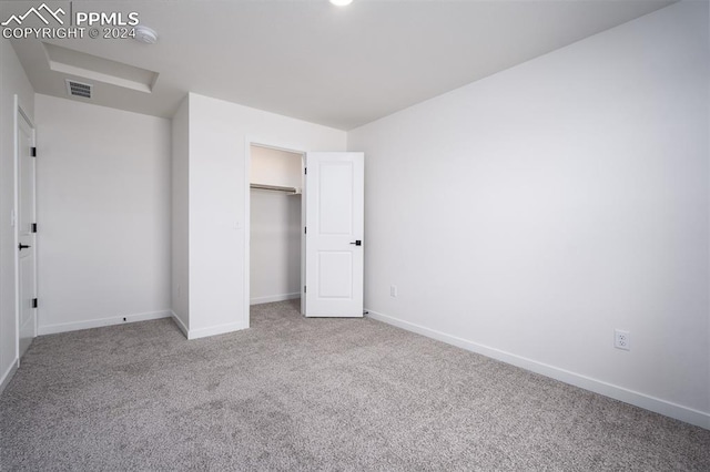 unfurnished bedroom featuring carpet flooring