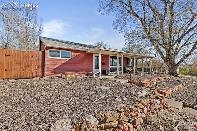 view of front of home with a patio area