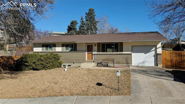 single story home with a garage