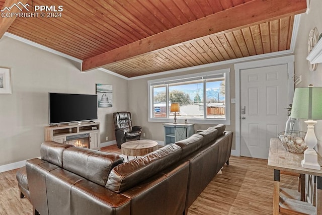 living room featuring vaulted ceiling with beams, light wood-type flooring, and wood ceiling