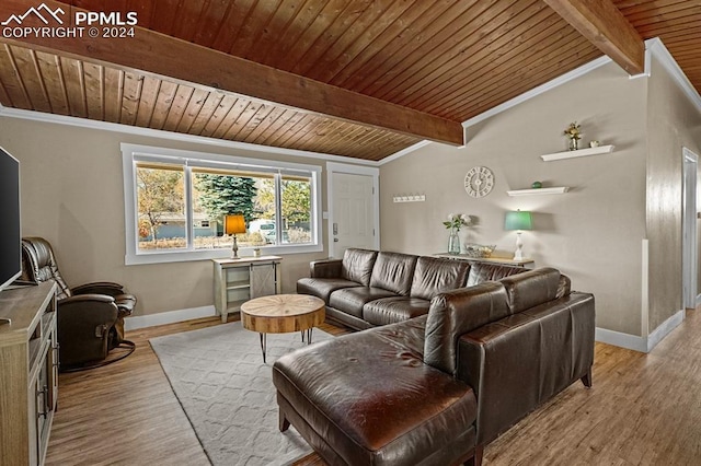 living room with lofted ceiling with beams, light hardwood / wood-style floors, and wood ceiling