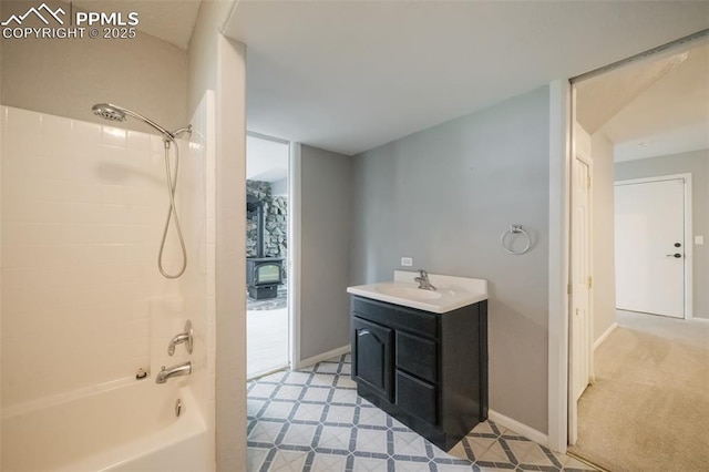 bathroom featuring vanity and shower / bathtub combination