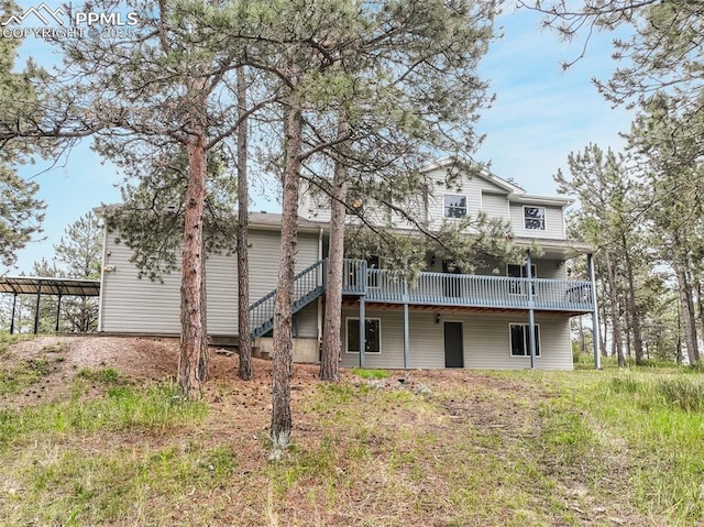 rear view of house with a deck