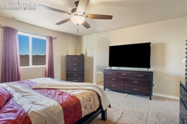 bedroom with ceiling fan and light colored carpet