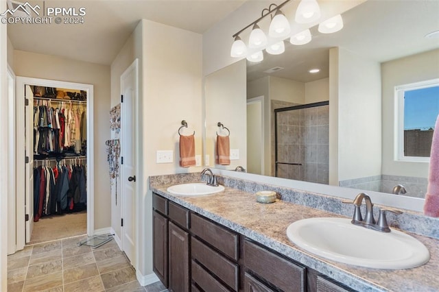 bathroom featuring vanity and walk in shower