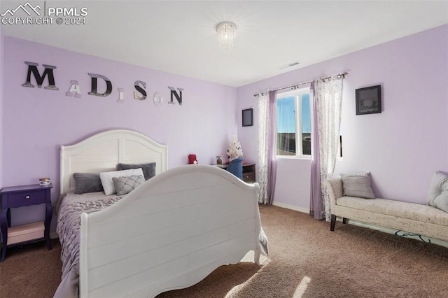 bedroom featuring carpet flooring