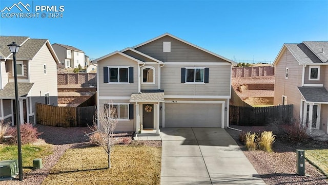 view of front of property with a garage