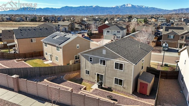 drone / aerial view featuring a mountain view