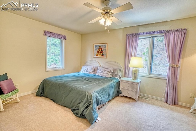 bedroom featuring carpet and ceiling fan